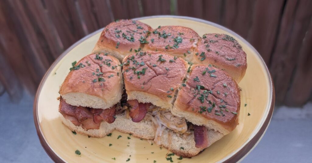 Cheesy Chicken Bacon Ranch Sliders on a plate.