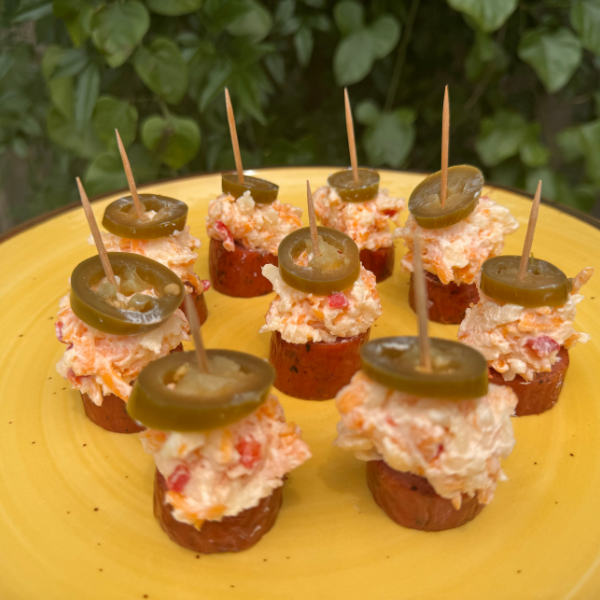 jalapeño smoked sausage sliced and topped with pimento cheese